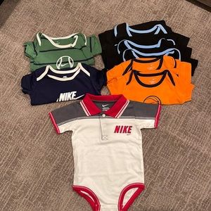 8 pc. Nike onesies